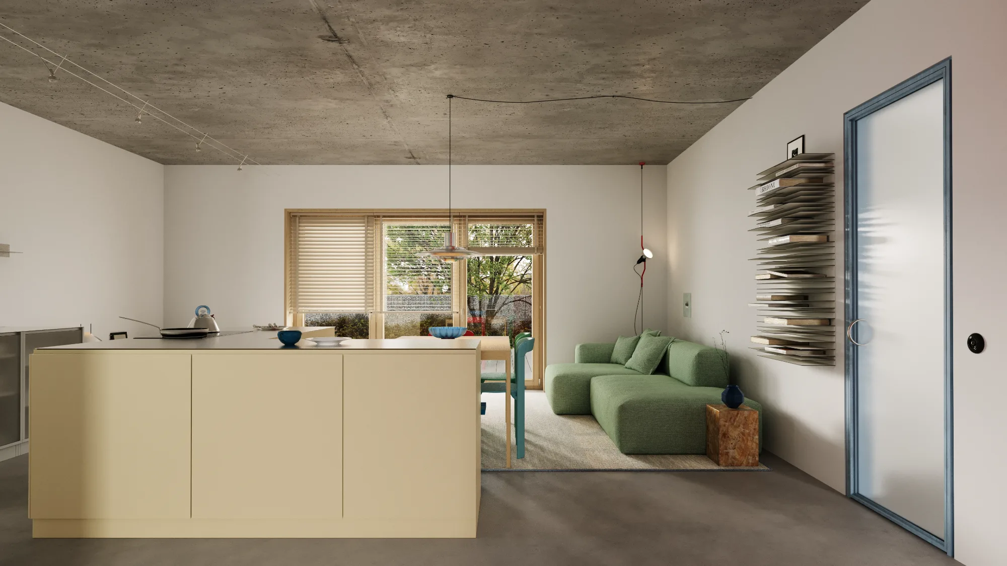 Contemporary open plan living space with kitchen island, green modular sofa, and garden patio doors
